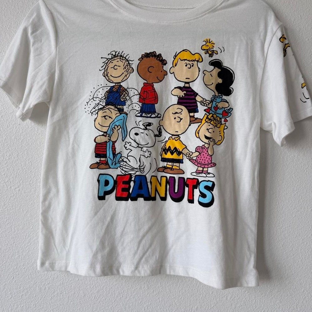 White Peanuts graphic tee with colorful details